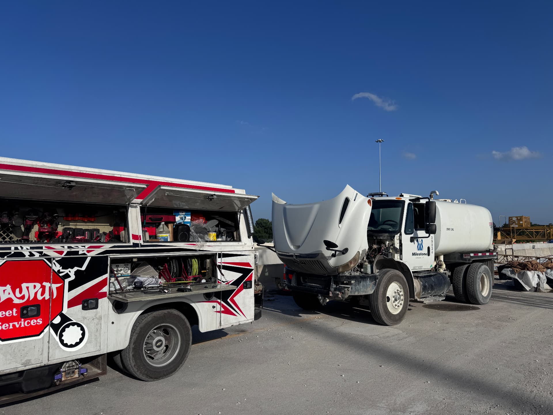 StayPut technician servicing a commercial truck in a fleet yard in Indianapolis